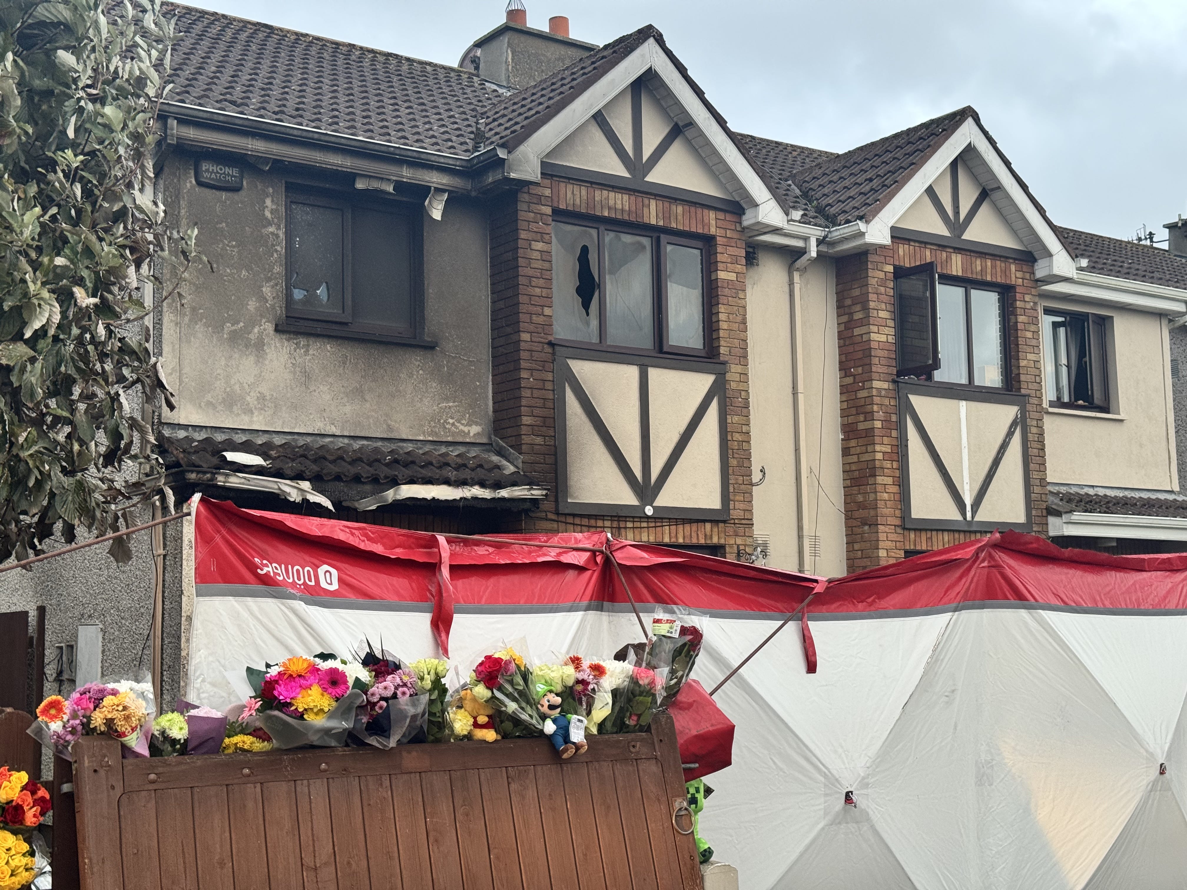Man and woman charged over fatal arson attack remanded into custody