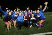Celebration: Brendan Cummins presenting a trophy to Fethard & District Rugby Football Club (RFC), the Irish winner of Royal London’s Championing Women’s and Girls’ Rugby Award. Also in the photo are Mary Gorey, Club Registrar, Sarah Johnston,  Honorary Secretary of the club  and U18 players with Fethard & District RFC