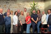 Fourteen members of the group of proponents who instigated the the Clonmel Business Improvement District initiative. 
