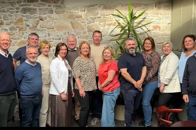 Fourteen members of the group of proponents who instigated the the Clonmel Business Improvement District initiative.