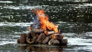 Fishermen light fire again on Kenny's Rock in Carrick-on-Suir as river water level remains low 