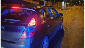 Gardai catch driver with pint in cup holder after near miss on busy Irish road