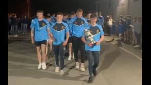 WATCH: Crowds descend on Holycross to welcome home minor heroes