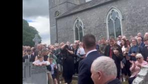 WATCH: Poignant moment at Harry Gleeson's burial as his fiddle is used to lay him to rest