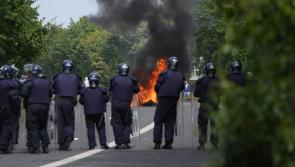Gardai make arrests after coming under attack with missiles at site earmarked for asylum seekers