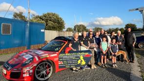 Couple undertaking charity drive in Porsche stop at Tipperary RNLI station