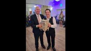 PICTURE: Popular Irish musical artist poses for photo with Liam MacCarthy Cup in Tipperary