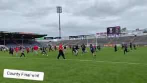 WATCH: Celebrations as Cashel King Cormacs fans storm the pitch following county final win