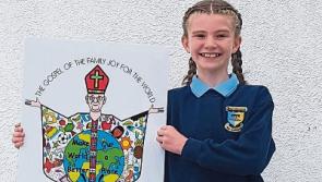 Tipperary schoolgirl presents vestments to Pope Francis at Croke Park ceremony