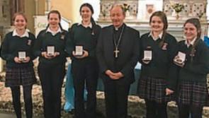 Bishop presents Carrick-on-Suir students with Pope John Paul 11 medals 