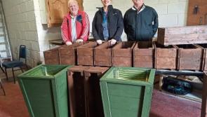 Tipperary Men's Shed groups present furniture to families