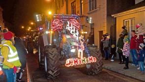 Parade of tractors decorated with 100,000 fairy lights dazzle the night sky in Co. Tipperary town 