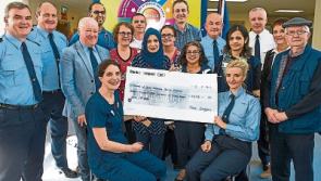 Garda Band concert in Clonmel raises funds for STGH and CARE