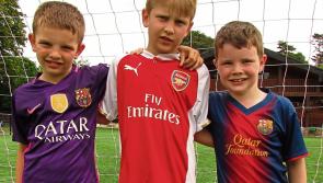 Delighted to be back - the boys and girls of Cahir Park AFC return