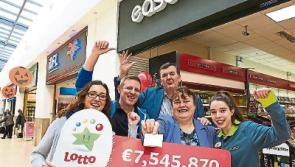 Tipperary winners of €7.5m lotto collect cheque - but haven't told their families yet!