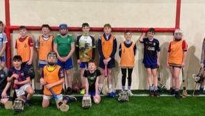 Young Fourmilewater hurlers give the new Ballymacabry astro turf the thumbs up!