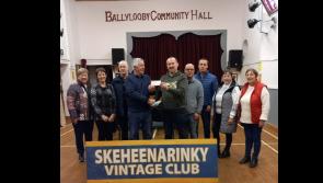 South Tipperary Vintage Club make presentation to support defibrillator upkeep at local hall