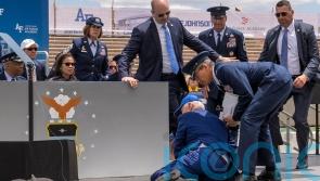 US president Joe Biden falls over after speech