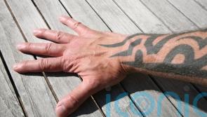 Garda’s policy of no visible tattoos to be retained, says Harris