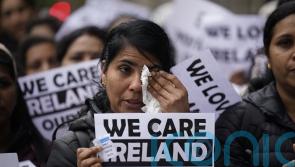 ‘Heartbroken’ migrant health workers protest outside Leinster House
