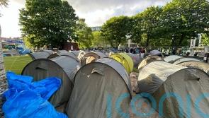 Operation to move migrants from Grand Canal encampment under way