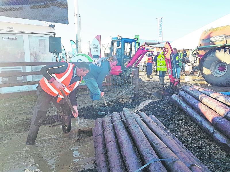 FRS Team out in force on Thursday morning of the ploughing get the FRS stand back to normal after the floods  