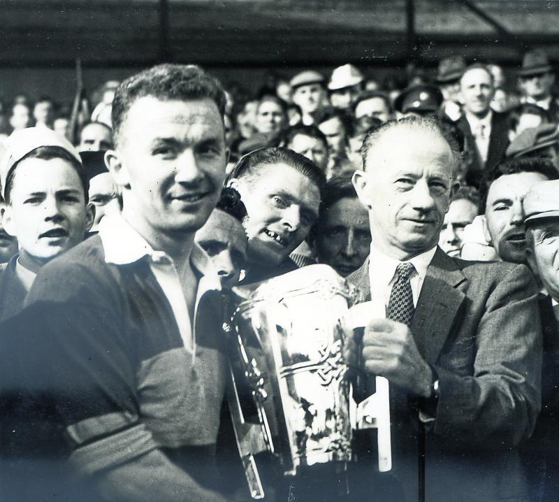 Tony Wall captained Tipperary to win the All-Ireland in 1958 and is pictured receiving the Liam McCarthy Cup