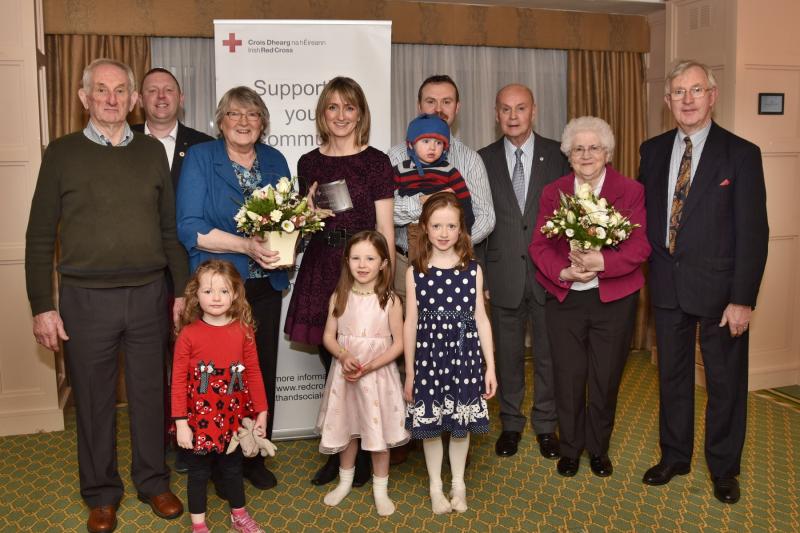 Larry Roche, Aiden Lonergan, Chairperson Health & Social Care Working Group, Josephine Shine-Roche, Catherine and John Gleeson and their children, Irish Red Cross Chairman Pat Carey, Biddy Gleeson and