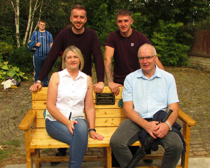 Daniel Gubbins remembered in a very special way by family and friends at unveiling of memorial seat in Cahir sensory garden