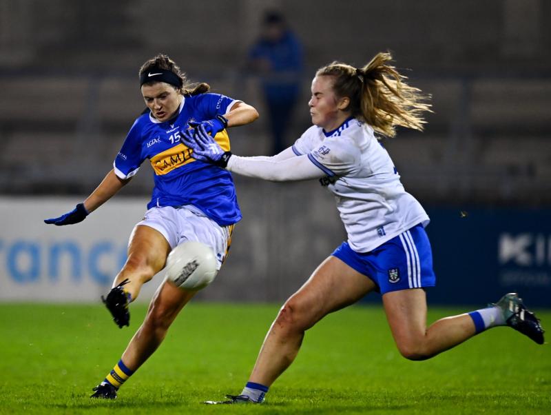  Roisin Howard of Tipperary scores her side's second goal despite the efforts of Jennifer Duffy of Monaghan during the TG4 All-Ireland Senior Ladies Football Championship Round 2 match between Monagha