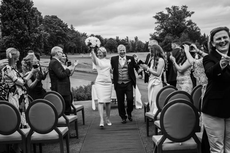 Golf club  captain Tony  ties the knot on first tee on Dundrum course