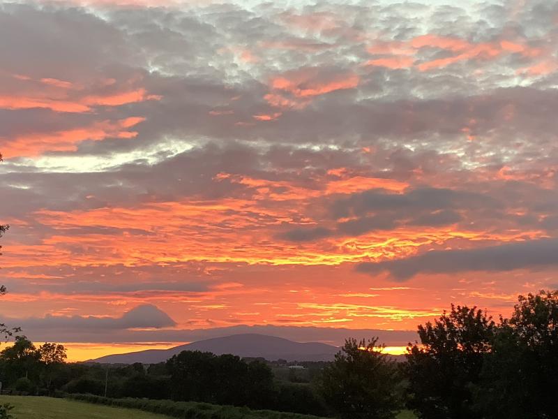 Alone, All Alone - Stunning photograph of sunset over Tipperary's iconic Slievenamon