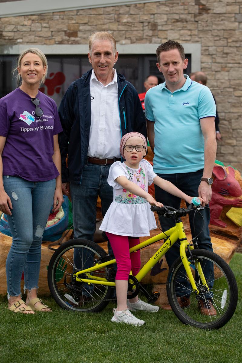 Siobhan and Ger  Ryan, pictured with their daughter Aoife and cycling legend Sean Kelly