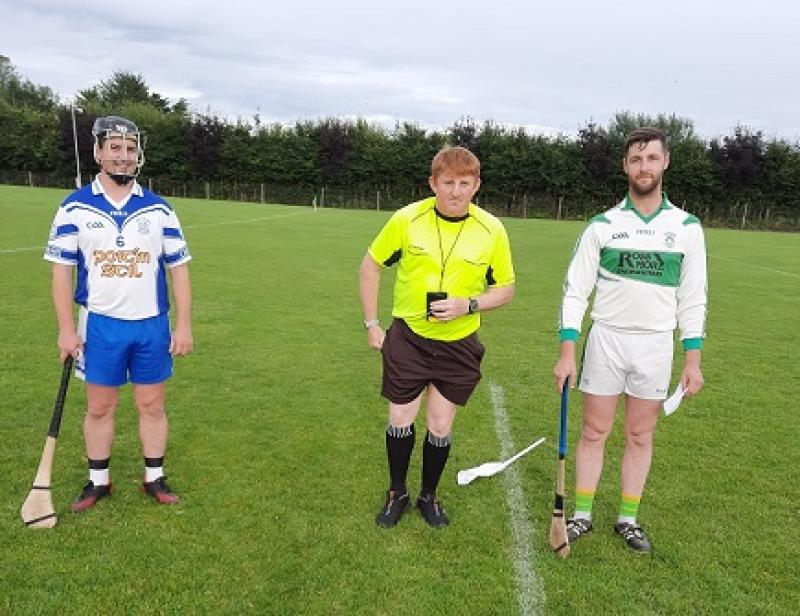Michael O'Neil (Cappawhite), Seanie Peters (Referee), Martin Sandler (Clonoulty-Rossmore) pictured before the game