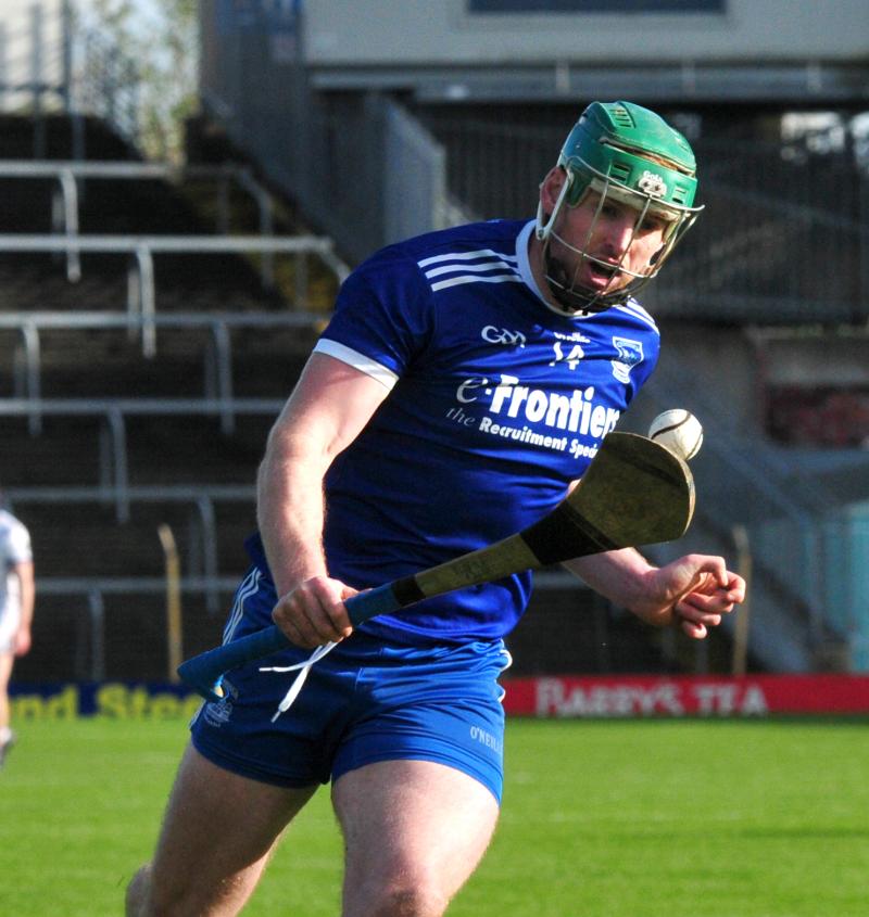 Sarsfields captain Denis Maher in action