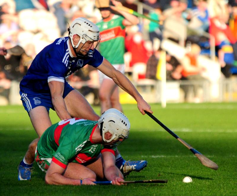 Paul maher for Sarsfields clashes with Ed Connolly of Loughmore Castleiney