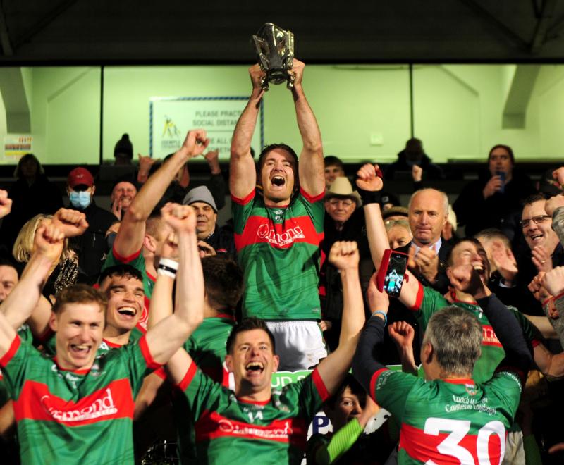 Noel McGrath lifts the Dan Breen Cup