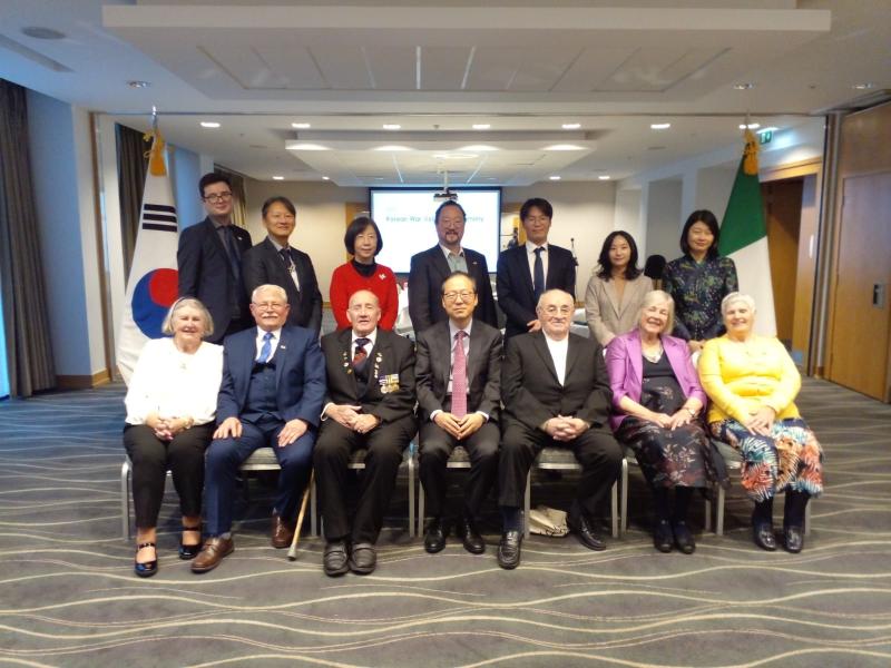 Above: John Wort (second from left in the front) and his wife Brigid (seated far right) pictured at the Korean Embassy where they were guests at the commemoration