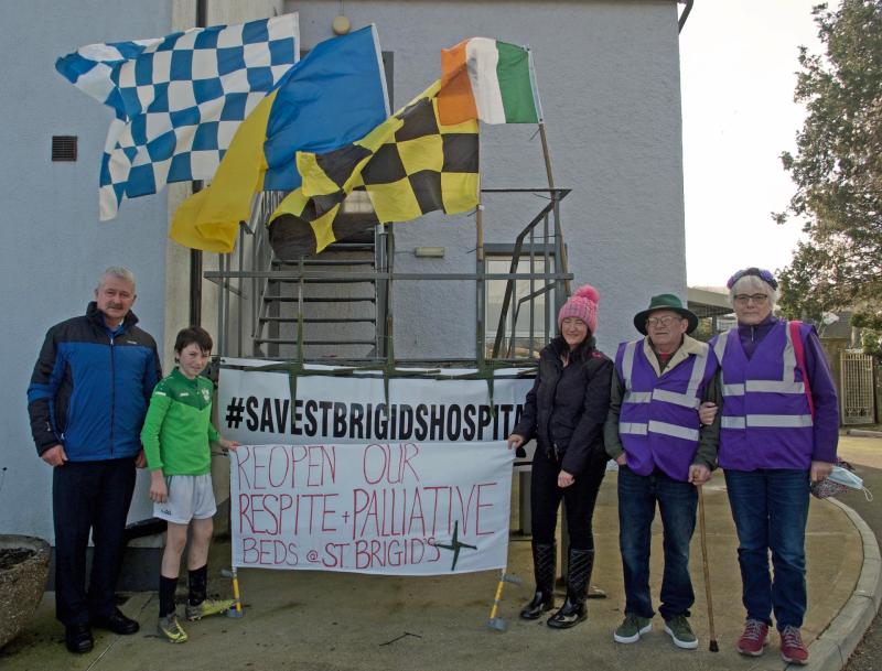 Protesters highlight the hardship closure of Carrick-on-Suir hospital has caused families