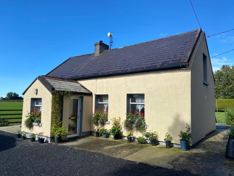 Threebedroom extended farmhouse with a large hay barn on sale in