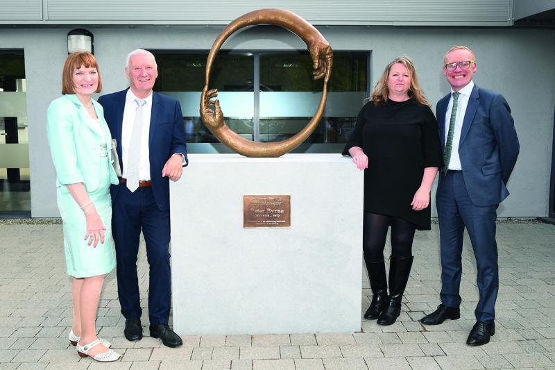 At the presentation of &lsquo;The Co-operative Hands of FRS&rsquo; bronze sculpture to Peter Byrne on his retirement from FRS Network after 42 years of service are: (left to right) Joan Byrne, Peter Byrne, former