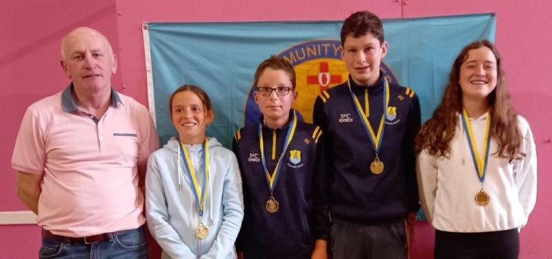 The successful Boherlahan Quiz Team with County Chairman Michael Maher