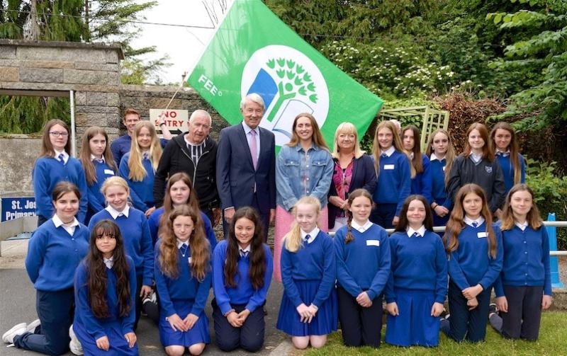 Deputy Michael Lowry pictured with pupils and staff of St Joseph's school in Tipperary town.