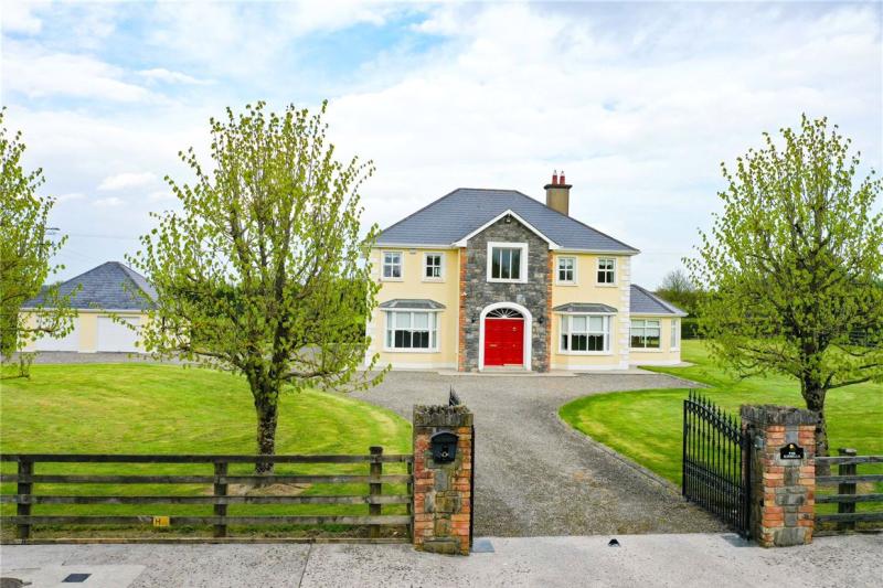 This elegant style country house is on sale in TwoMile