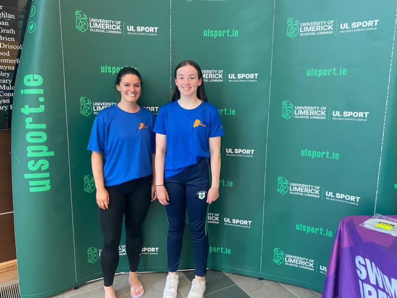 Kingfisher Swim Club member Eimear Duggan (right) pictured with her  Coach, Kirsty Harris after swimming a personal best in UL. Well done Eimear.