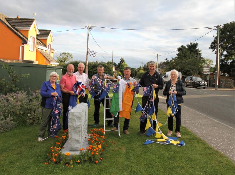 Members of the Lorrha Martin O&rsquo;Meara VC Committee and helpers erecting the bunting and decorating Lorrha village in preparation for the visit of the Martin O&rsquo;Meara Victoria Cross on Saturday August 13