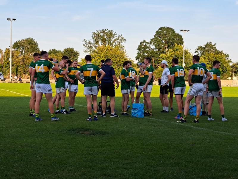 The Clonmel Commercials players pictured taking on water in the break during the game this evening in Golden