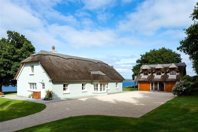 WOW: This lakeside thatched country home is on sale in Tipperary for €1,150,000
