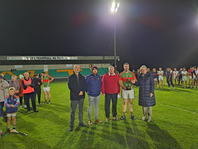 Loughmore Castleiney captain Stephen ryan accepts the Johnny Everard Cup from Mary Everard, Joe O'Sullivan, Mark Dunne and Damien Cullen, representing sponsors Thurles Credit Union