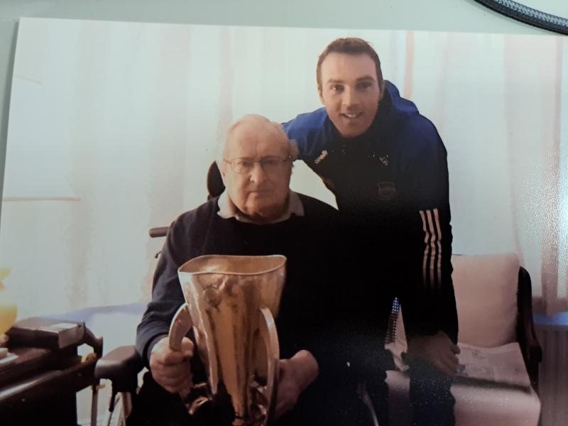 John O'Grady pictured with Tipp minor hurling Manager James Woodlock and the Irish Press Cup